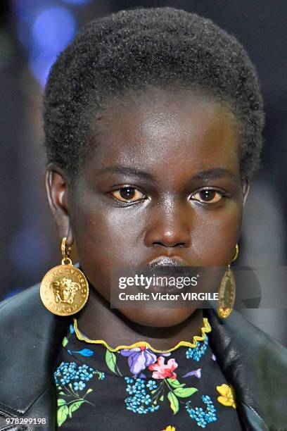 Model walks the runway at the Versace Fashion show during Milan Men's Fashion Week Spring/Summer 2019 on June 16, 2018 in Milan, Italy.