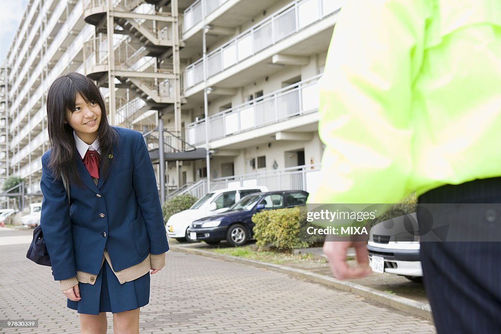 Teenage girl greeting super