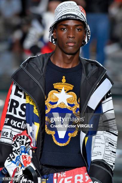 Model walks the runway at the Versace Fashion show during Milan Men's Fashion Week Spring/Summer 2019 on June 16, 2018 in Milan, Italy.