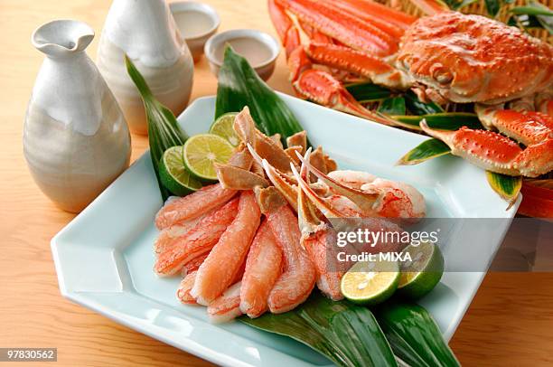 tanner crab and sake - chionoecetes opilio stock pictures, royalty-free photos & images
