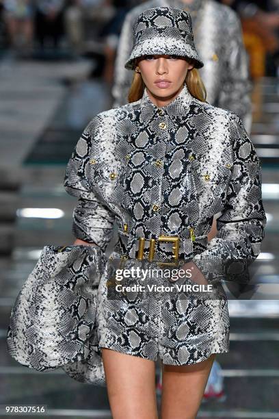 Model walks the runway at the Versace Fashion show during Milan Men's Fashion Week Spring/Summer 2019 on June 16, 2018 in Milan, Italy.