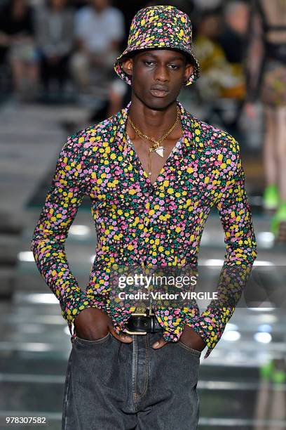 Model walks the runway at the Versace Fashion show during Milan Men's Fashion Week Spring/Summer 2019 on June 16, 2018 in Milan, Italy.