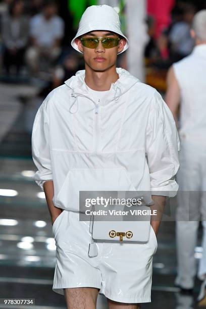 Model walks the runway at the Versace Fashion show during Milan Men's Fashion Week Spring/Summer 2019 on June 16, 2018 in Milan, Italy.