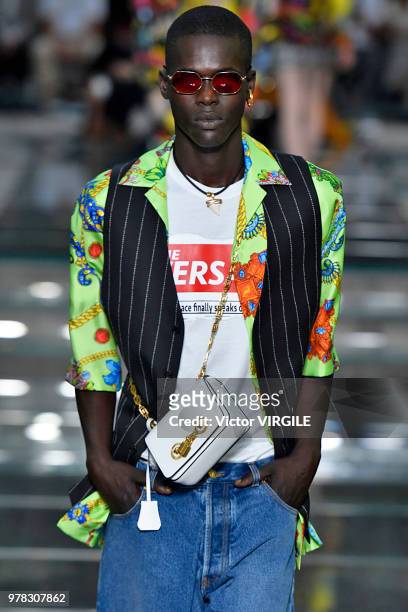 Model walks the runway at the Versace Fashion show during Milan Men's Fashion Week Spring/Summer 2019 on June 16, 2018 in Milan, Italy.
