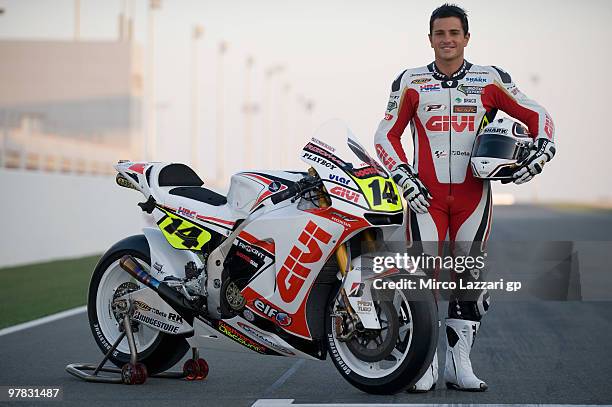 Randy De Puniet of France and LCR Honda MotoGP poses on the track with his bike during the official photo for the start of the season during the...