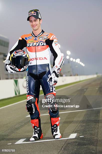 Andrea Dovizioso of Italy and Repsol Honda Team poses on the track during the official photo for the start of the season during the second day of...
