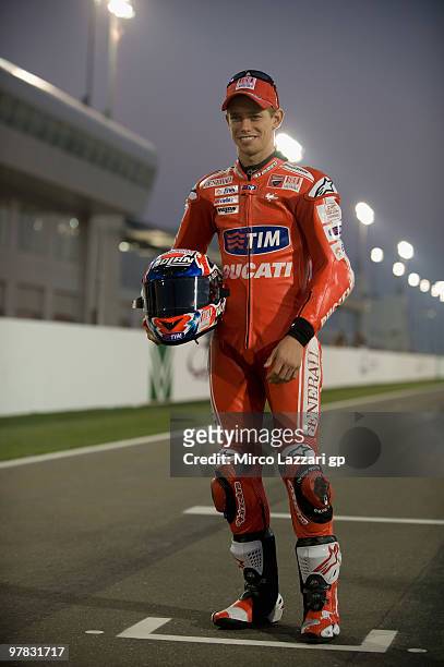 Casey Stoner of Australia and Ducati Marlboro Team poses on the track during the official photo for the start of the season during the second day of...