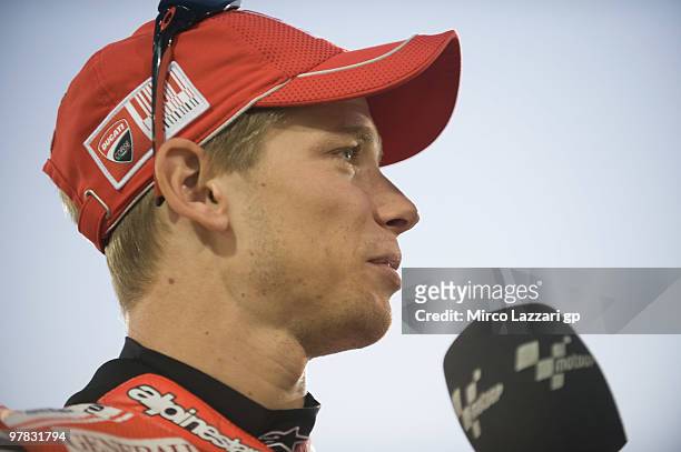 Casey Stoner of Australia and Ducati Marlboro Team speaks to the media during the official photo for the start of the season during the second day of...