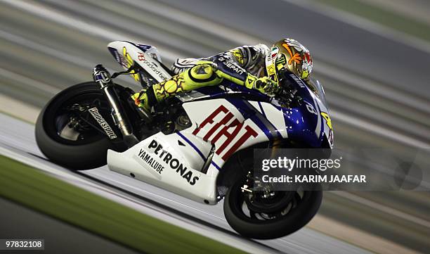 Italy's MotoGP rider Valentino Rossi of Fiat Yamaha Team races during the final pre-season test at the Losail International Circuit in the Qatari...