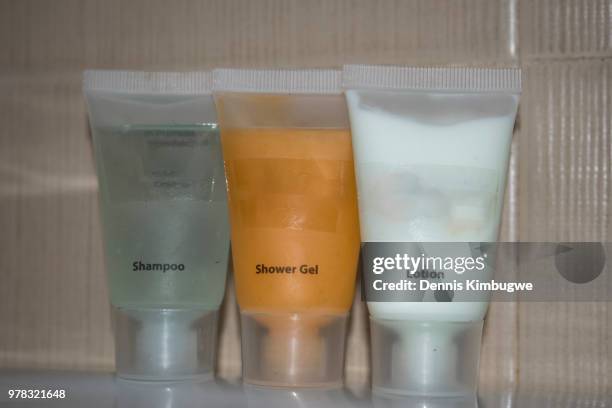 shampoo, shower gel and lotion. - shampoo stockfoto's en -beelden