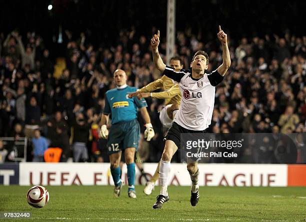 Zoltan Gera of Fulham celebrates scoring his penalty during the UEFA Europa League Round of 16 second leg match between Fulham and Juventus at Craven...