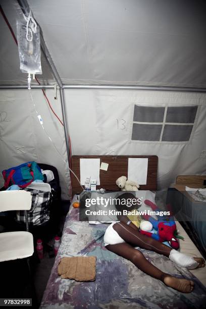 Henry Joesph, 4 year old earthquake survivor, at the Red Cross medical observation tent inside General Hospital on February 8, 2010 in...