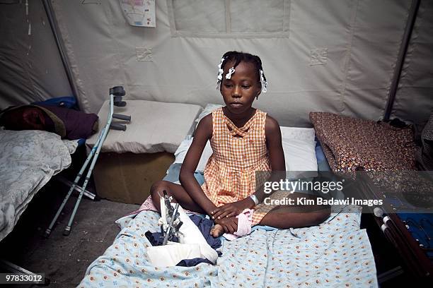 Rosena Favecal, earthquake survivor, at the Red Cross medical observation tent inside General Hospital on February 8, 2010 in Port-au-Prince, Haiti....