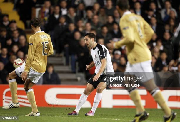 Clint Dempsey of Fulham shoots to score during the UEFA Europa League Round of 16 second leg match between Fulham and Juventus at Craven Cottage on...