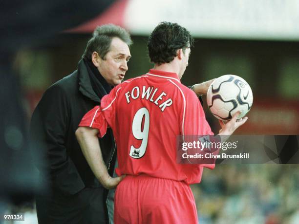 The Liverpool manager Gerard Houllier speaks to Robbie Fowler during the match between Leicester City v Liverpool in the FA Carling Premiership at...