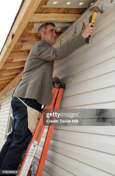 Taylor Hicks lends a hand to Habitat For Humanity on March 18, 2010 in Birmingham, Alabama.