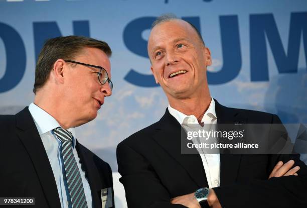 April 2018, Germany, Berlin: Tom Enders , chief executive of Airbus, and Johannes Bussmann, CEO of the Lufthansa Technik AG, attending the Berlin...