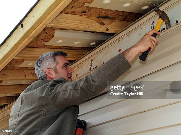 Taylor Hicks lends a hand to Habitat For Humanity on March 18, 2010 in Birmingham, Alabama.