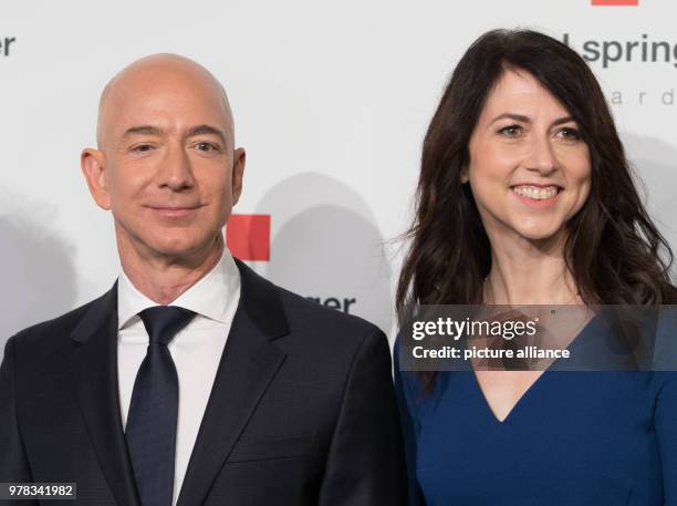 April 2018, Germany, Berlin: Head of Amazon Jeff Bezos and his wife MacKenzie Bezos arrive for the Axel Springer award ceremony. Bezos will be...