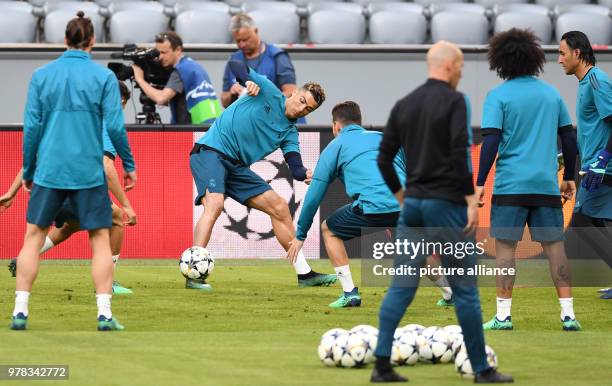 Real Madrid's Cristiano Ronaldo in action with teammates during their team's final training session ahead of Wednesday's UEFA Champions League...