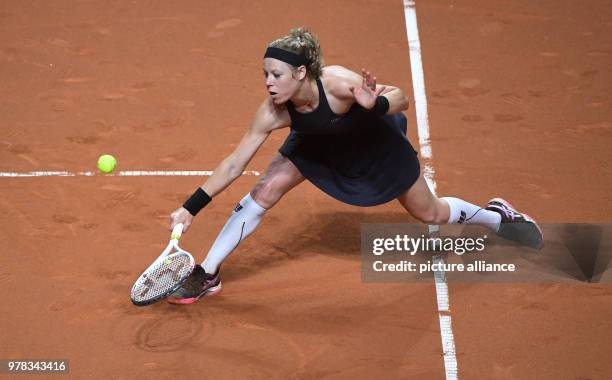 April 2018, Germany, Stuttgart: Tennis: WTA-Tour - Stuttgart, singles, women: Laura Siegemund of Germany in action against Strycova of the Czech...