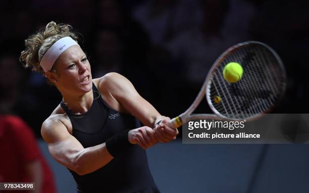 April 2018, Germany, Stuttgart: Tennis: WTA-Tour - Stuttgart, singles, women. Laura Siegemund of Germany in action against Strycova of the Czech...