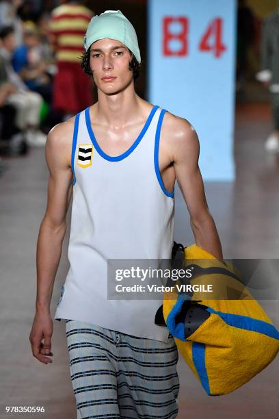 Model walks the runway at the Marni fashion show during Milan Men's Fashion Week Spring/Summer 2019 on June 16, 2018 in Milan, Italy.