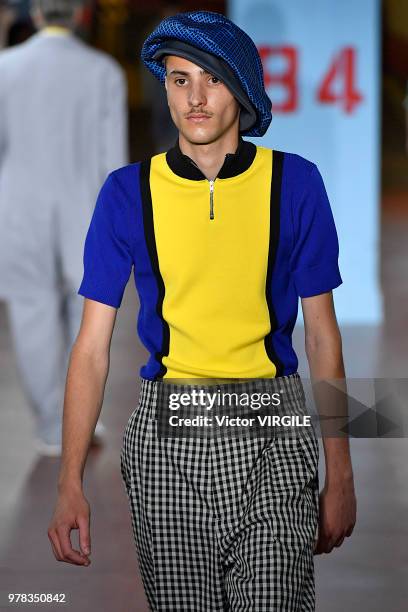 Model walks the runway at the Marni fashion show during Milan Men's Fashion Week Spring/Summer 2019 on June 16, 2018 in Milan, Italy.