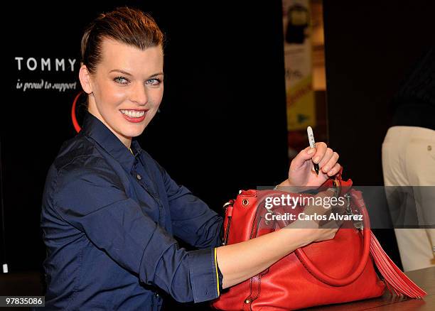 Actress Milla Jovovich presents the Tommy Hilfiger limited edition Bag at the El Corte Ingles store on March 18, 2010 in Madrid, Spain.