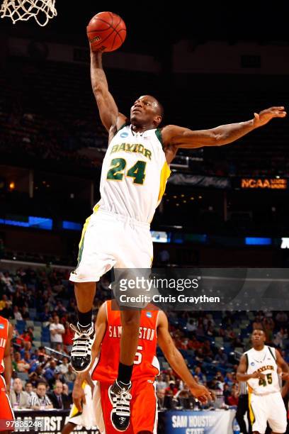 LaceDarius Dunn of the Baylor Bears dunks the ball against the Sam Houston State Bearkats during the first round of the 2010 NCAA men's basketball...