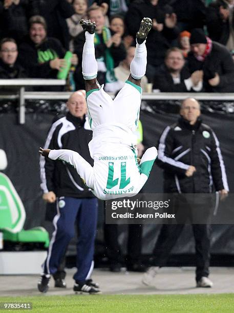 Obafemi Martins of Wolfsburg celebrates after scoring his team's first goal during the UEFA Europa League round of 16 second leg match between VfL...