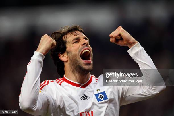 Ruud van Nistelrooy of Hamburg celebrates his team's third goal scored by his team mate Mladen Petric during the UEFA Europa League round of 16...