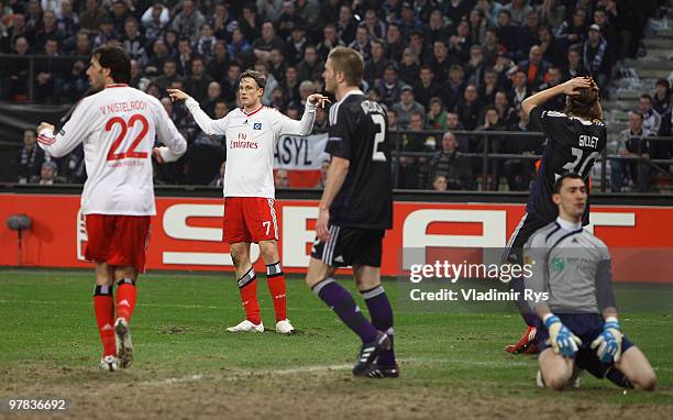 Marcell Jansen of Hamburg celebrates after scoring his team's second goal during the UEFA Europa League round of 16 second leg match between RSC...