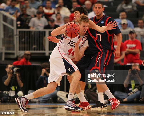 Clint Stiendl of the Saint Mary's Gaels presses Ryan Butler of the Richmond Spiders during the first round of the 2010 NCAA men's basketball...