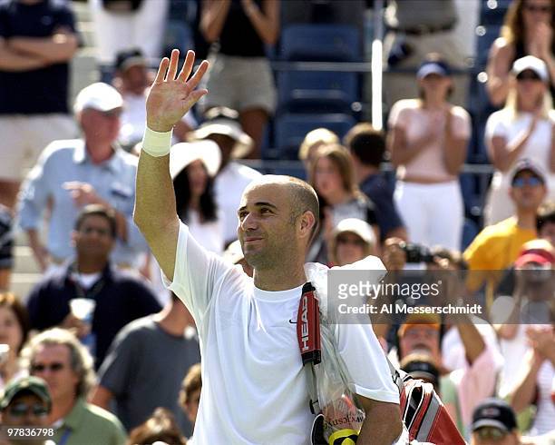 Andre Agassi, U. S. A., waives to the crowd Sunday, August 31, 2003 at the U. S. Open in New York. Agassi, the top seed in the tournament, defeated...