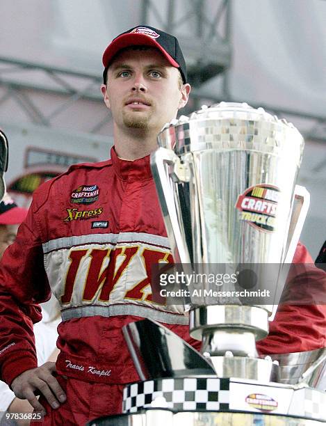 Travis Kvapil wins the points championship trophy at the NASCAR Craftsman Truck Series Ford 200 race Friday, November 14, 2003 at Homestead-Miami...