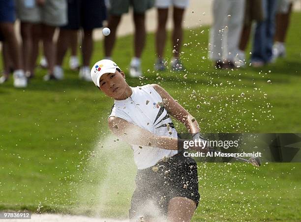 Se Ri Pak blasts from the sand on the first hole Sunday, October 12, 2003 at the Samsung World Championship in Houston, Texas. Pak tied for second...