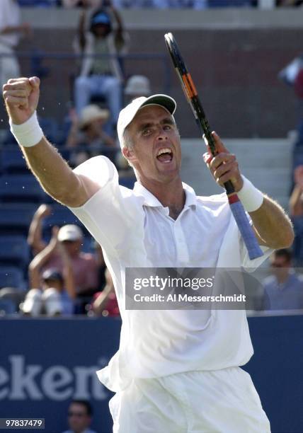 Todd Martin, U. S. A., celebrates his victory Thursday, August 28,2003 on the Ashe court at the U. S. Open. Martin upset 16-seeded Martin Verkerk of...
