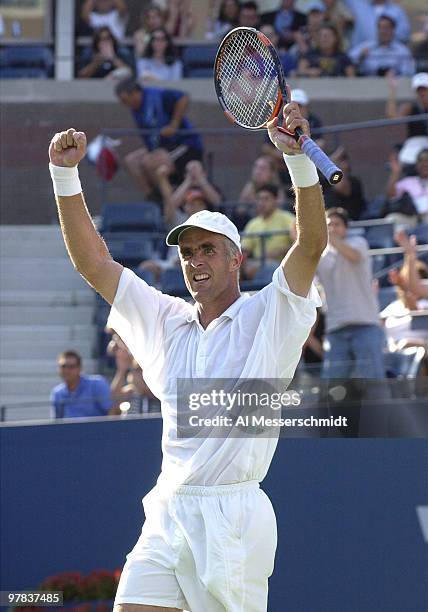 Todd Martin, U. S. A., celebrates his victory Thursday, August 28,2003 on the Ashe court at the U. S. Open. Martin upset 16th - seeded Martin Verkerk...