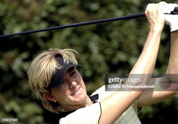 Beth Daniel follows a tee shot on the fourth hole Sunday, October 12, 2003 in the final round of the Samsung World Championship in Houston, Texas....