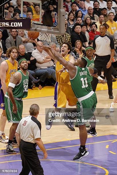Sasha Vujacic of the Los Angeles Lakers shoots a layup against Glen Davis of the Boston Celtics during the game at Staples Center on February 18,...