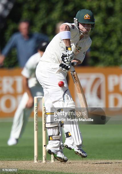 Phillip Hughes of Australia whips one off the hips during day one of the First Test match between New Zealand and Australia at Westpac Stadium on...