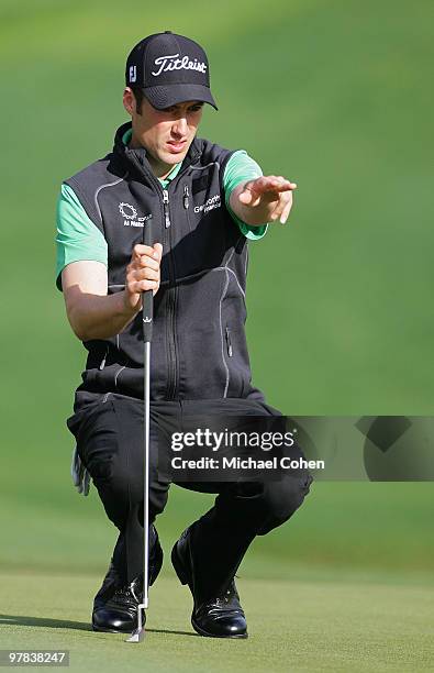 Ross Fisher of England lines up a putt during the first round of the Transitions Championship at the Innisbrook Resort and Golf Club held on March...