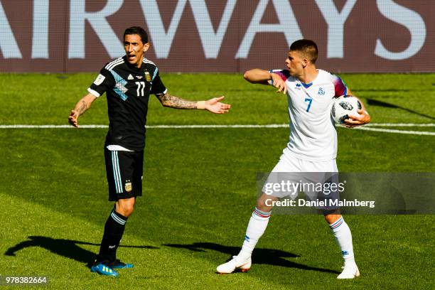 Angel Di Maria of Argentina and Johann Gudmundsson of Iceland in a dispute during the 2018 FIFA World Cup Russia group D match between Argentina and...