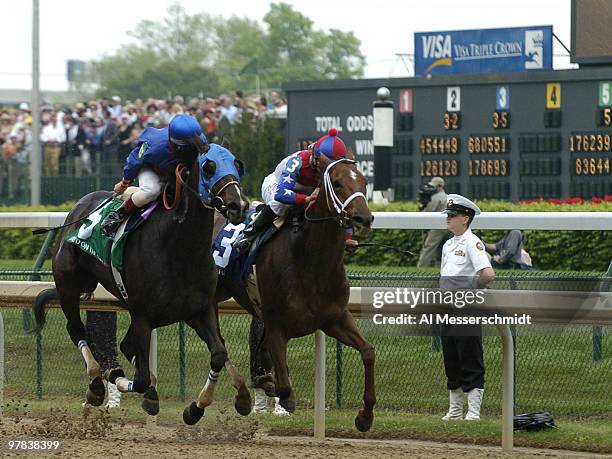 Azeri and Mayo on the Side battle for the lead in the eight race, the Humana Distaff Handicap, before the 130th running of the Kentucky Derby, May 1,...