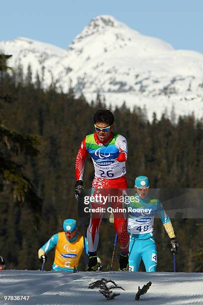 Yoshihiro Nitta of Japan compete in the Men's 10km Standing Cross-Country Skiing during Day 7 of the 2010 Vancouver Winter Paralympics at Whistler...