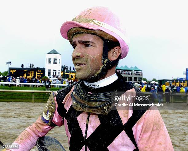Jockey Kent J. Desorneaux shows the mud of a third place finish aboard Imperialism Smarty Jones in the 130th running of the Kentucky Derby, May 1,...