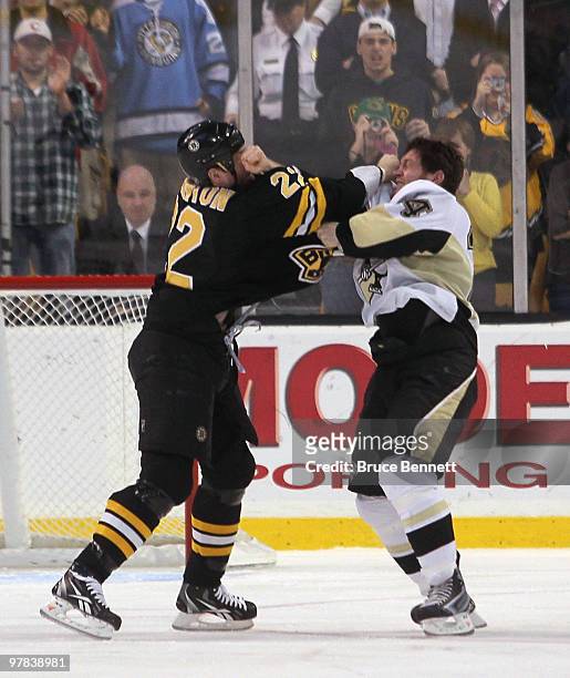 Shawn Thornton of the Boston Bruins fights with Matt Cooke of the Pittsburgh Penguins at the TD Garden on March 18, 2010 in Boston, Massachusetts.