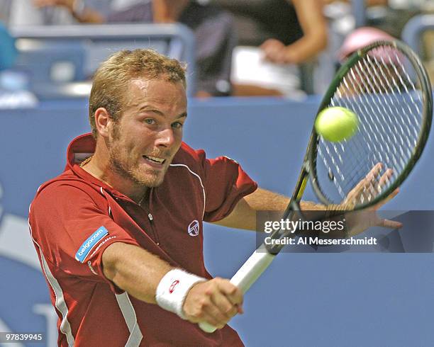 Olivier Rochus defeats third-seeded Carlos Moya in the third round of the men's singles September 4, 2004 at the 2004 US Open in New York.