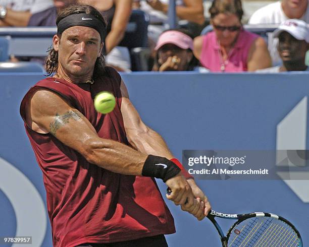 Third-seeded Carlos Moya loses to Olivier Rochus in the third round of the men's singles September 4, 2004 at the 2004 US Open in New York.